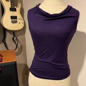 The limited tank top. Purple color with a small amount of sparkle on front XS
